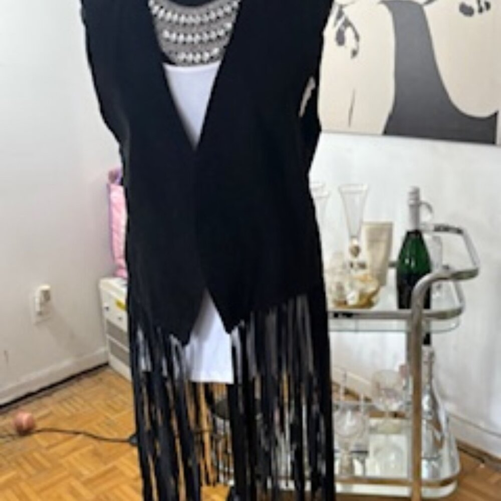 Vintage long fringe suede vest.